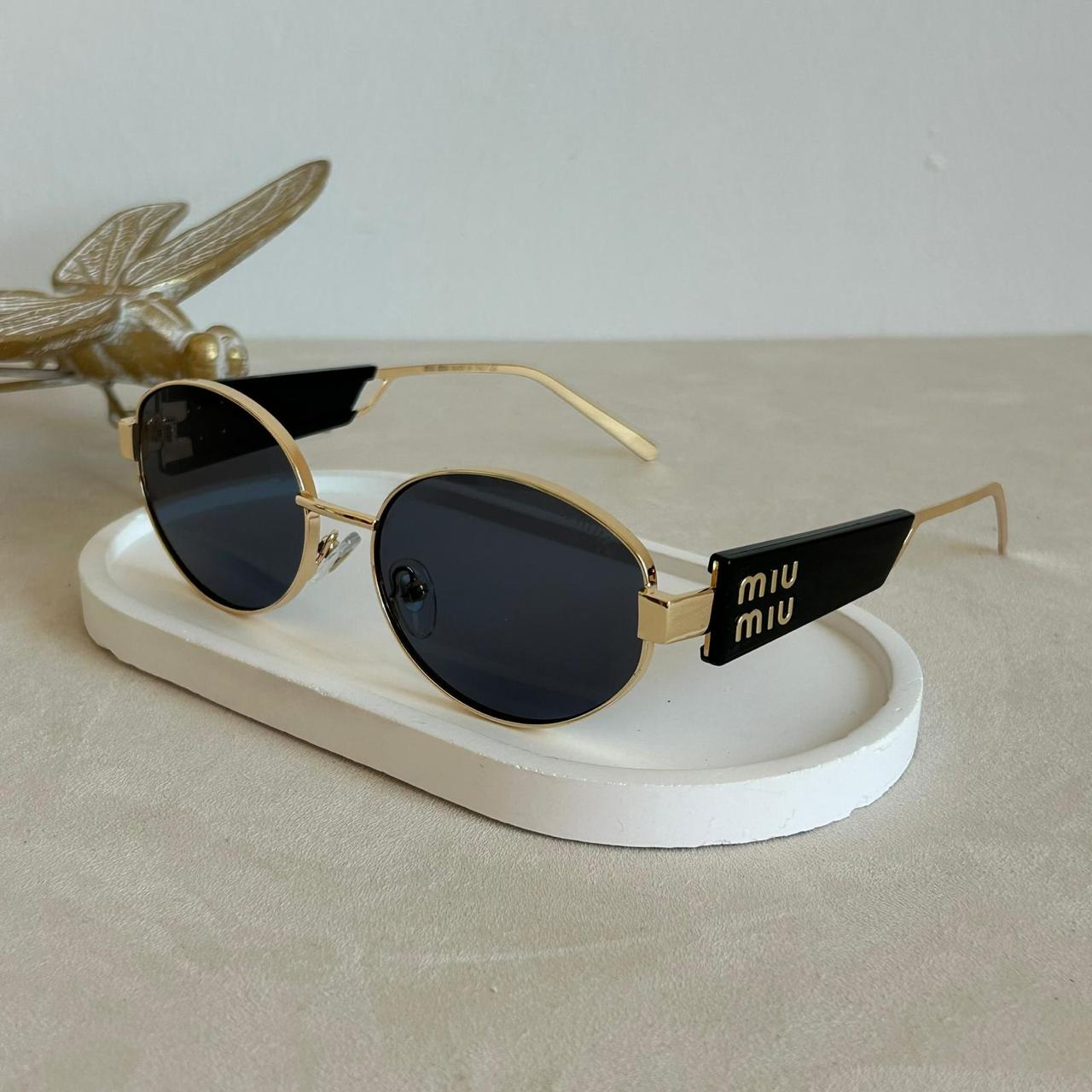 Miu Miu Black gold